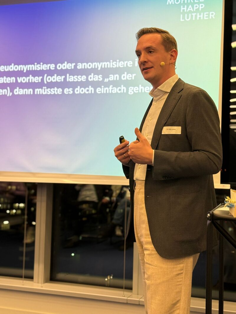 Dr. Robin Schoss speaking at MÖHRLE HAPP LUTHER